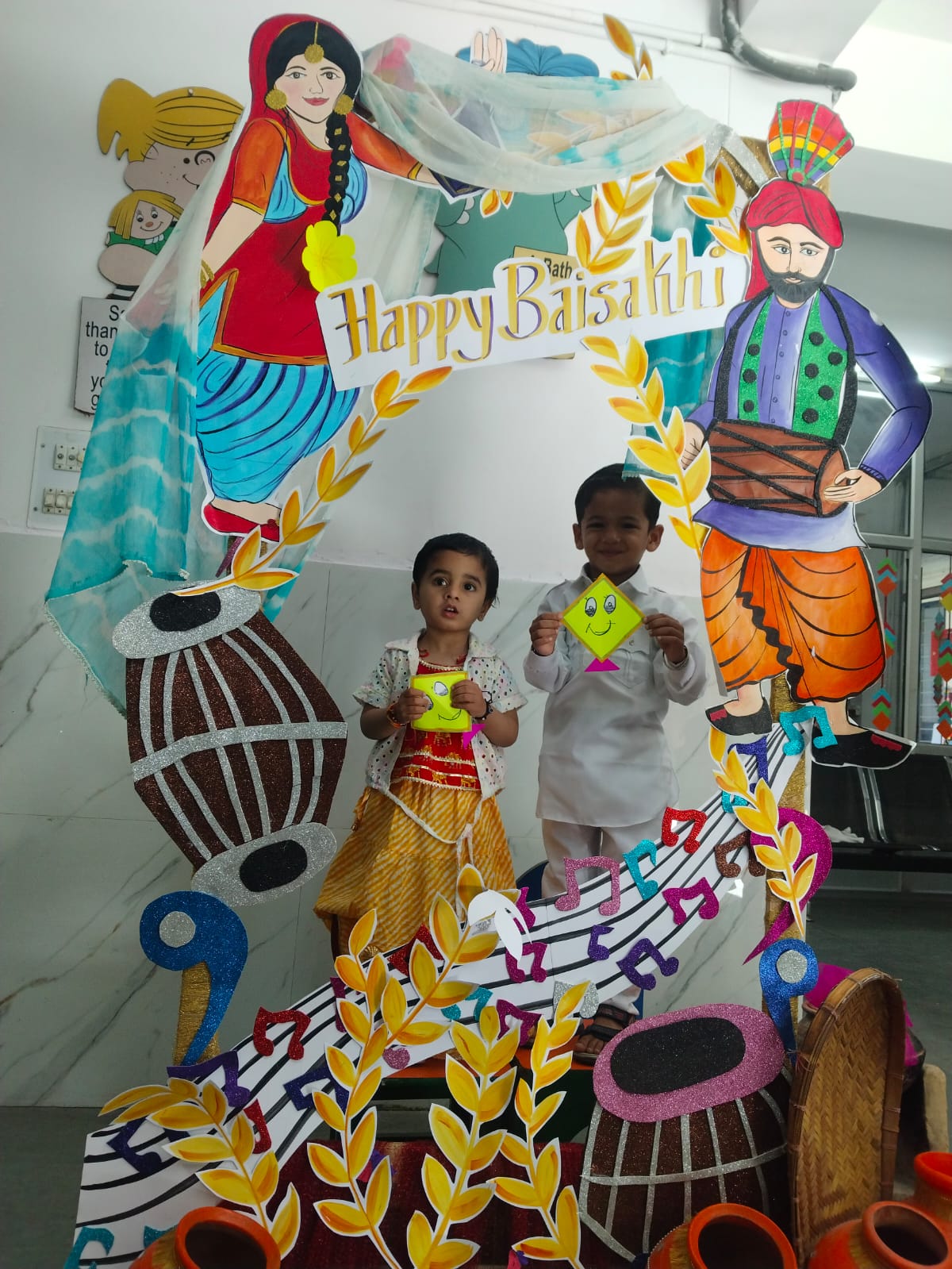 Toddlers smiling for Baisakhi